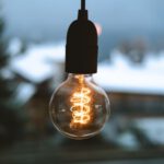 Smart Lighting - selective focus photography of light bulb