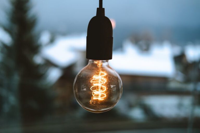 Smart Lighting - selective focus photography of light bulb