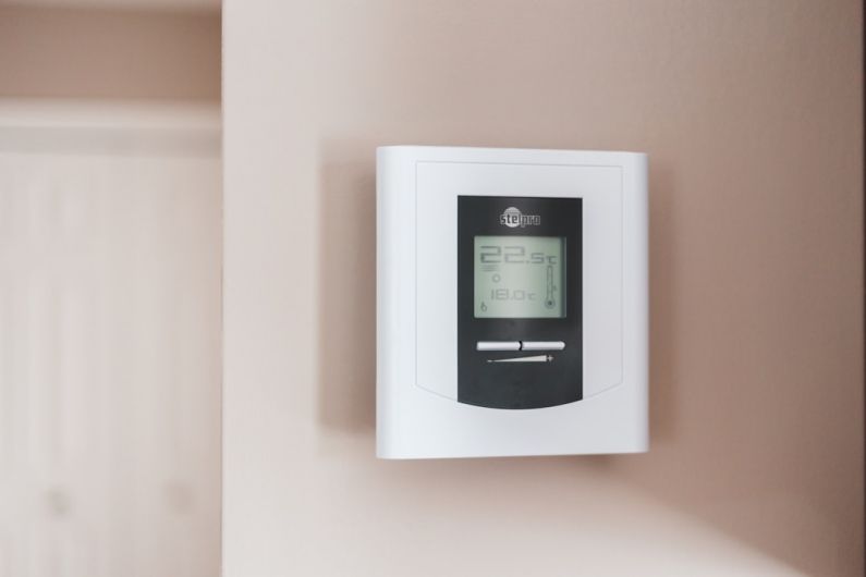 Smart Thermostat - white and gray thermostat at 19 5