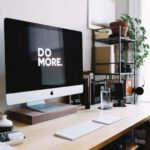 Home Network - silver iMac with keyboard and trackpad inside room