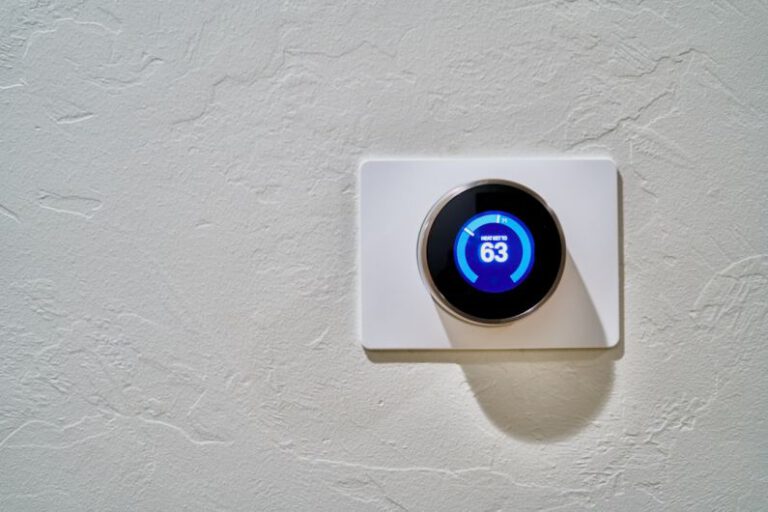 Smart Thermostat - white thermostat at 62
