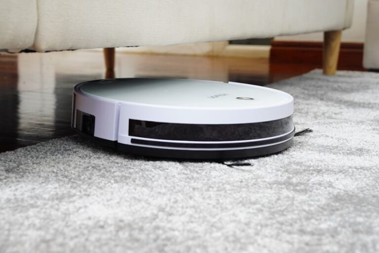 Robot Vacuum - white and black device